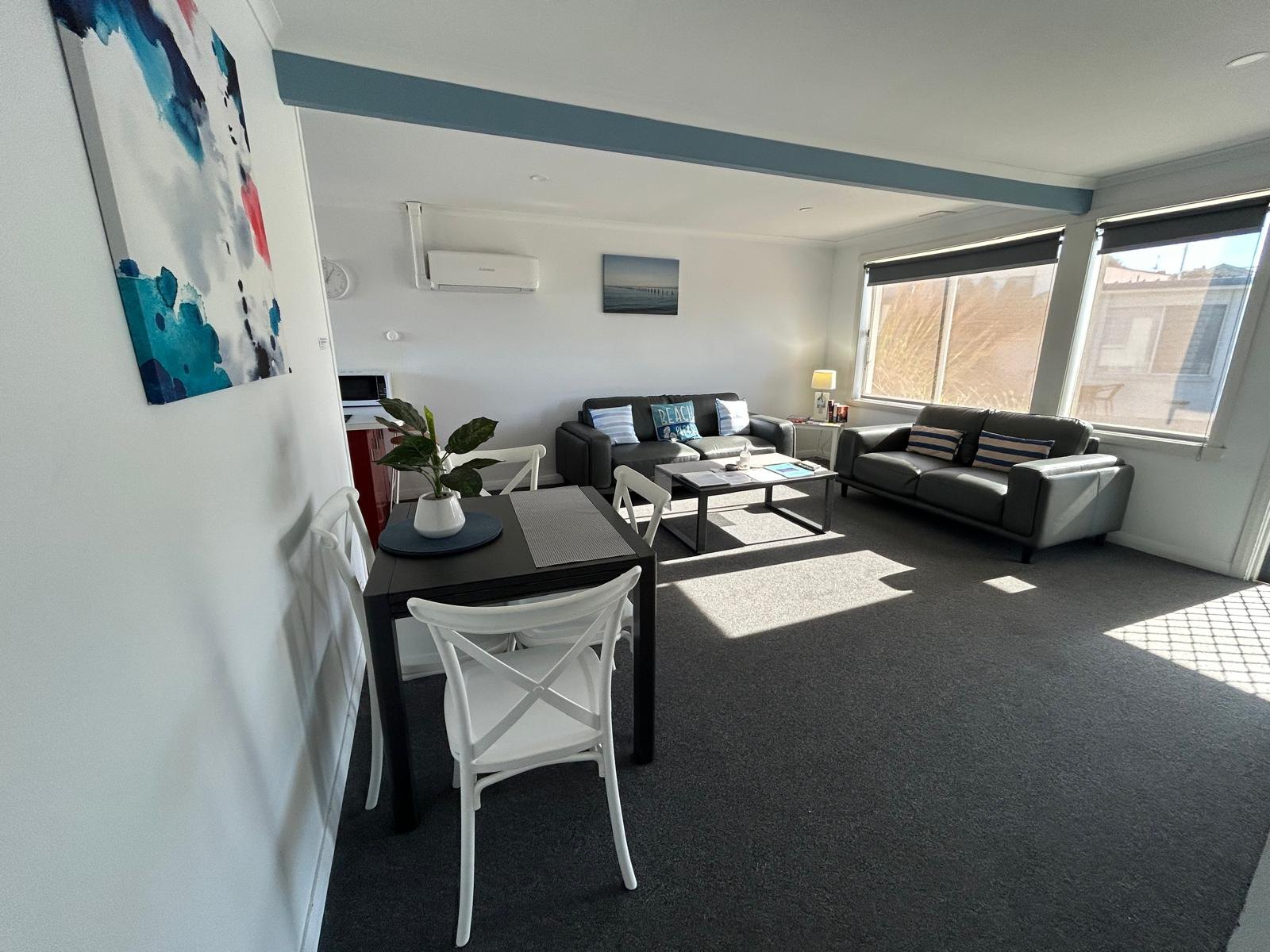 Living area of Apartment One at Old Pier Apartments