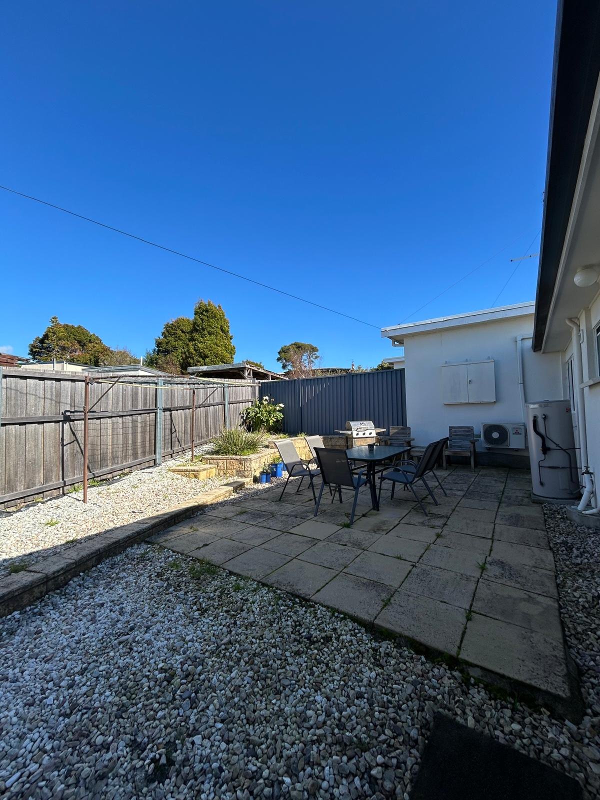 Garden and outdoor seating beside Apartment One