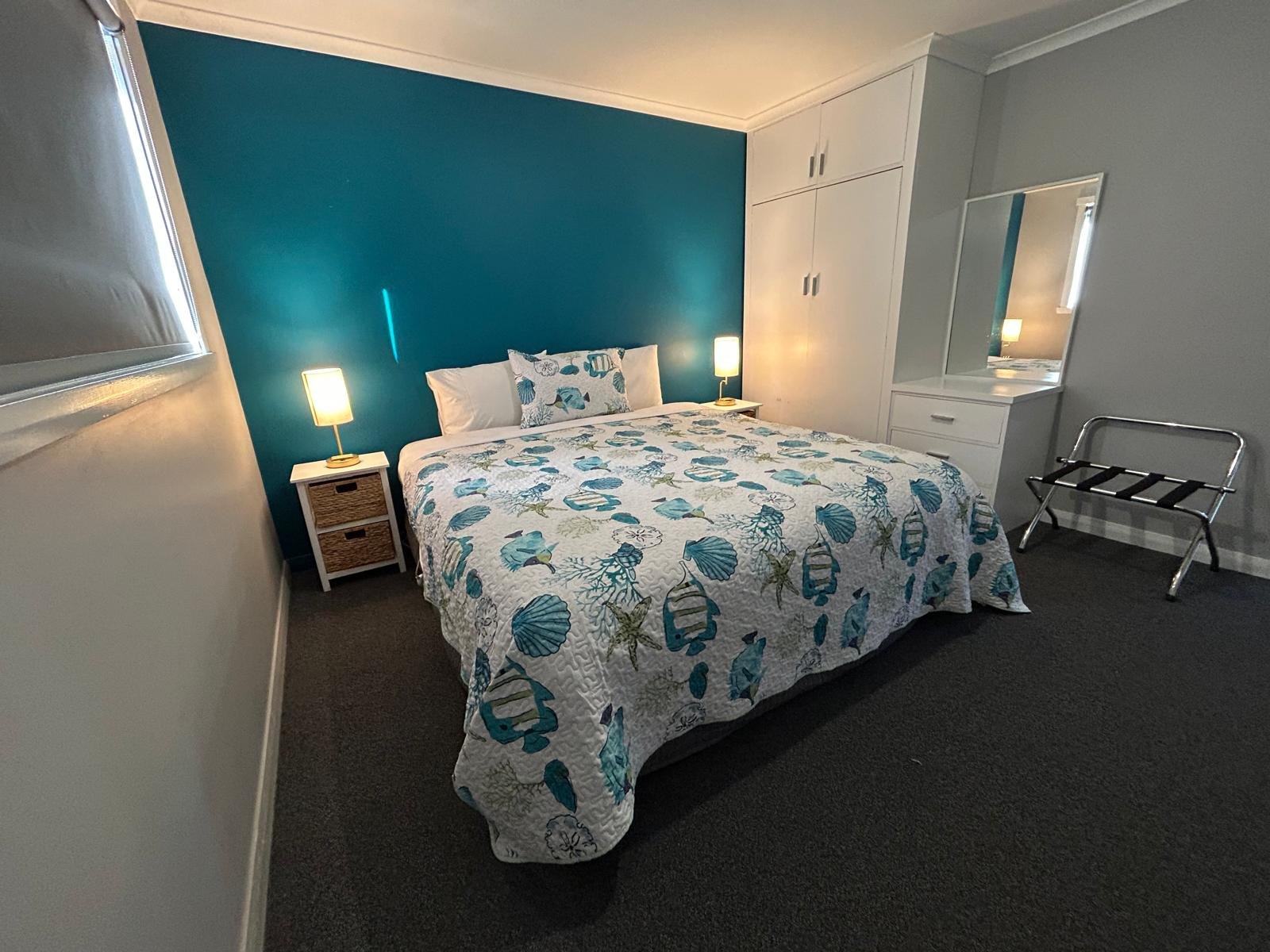 Main bedroom with double bed in Apartment Two