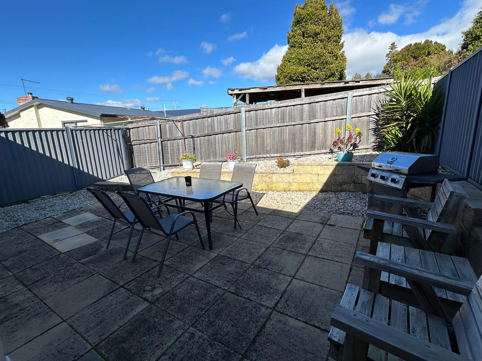 Private courtyard with barbeque and outdoor dining