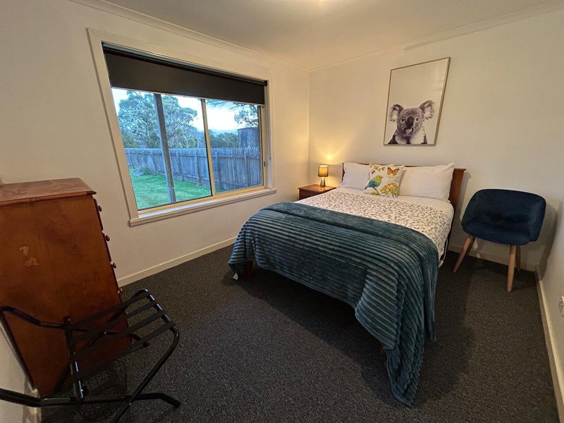 Third bedroom with double bed and reading chair