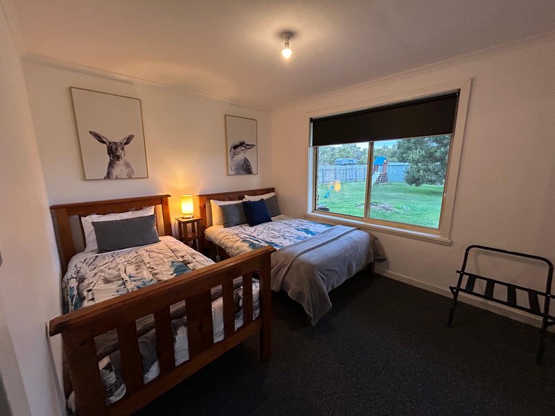 Second bedroom with double and single beds