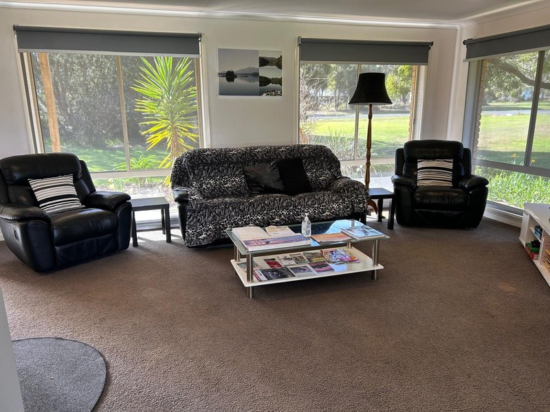 Second lounge with recliners and garden outlook